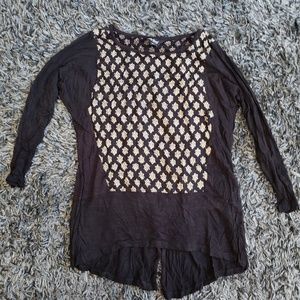 Black and cream pattern shirt
